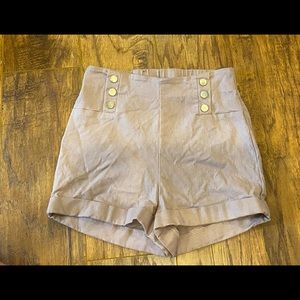 Stretchy dusty pink mauve shorts with cute button detail